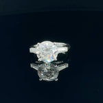 14K White Gold 4.23 cttw Round Brilliant Cut Lab Grown Diamond Engagement Ring With Tapered Baguette Accents