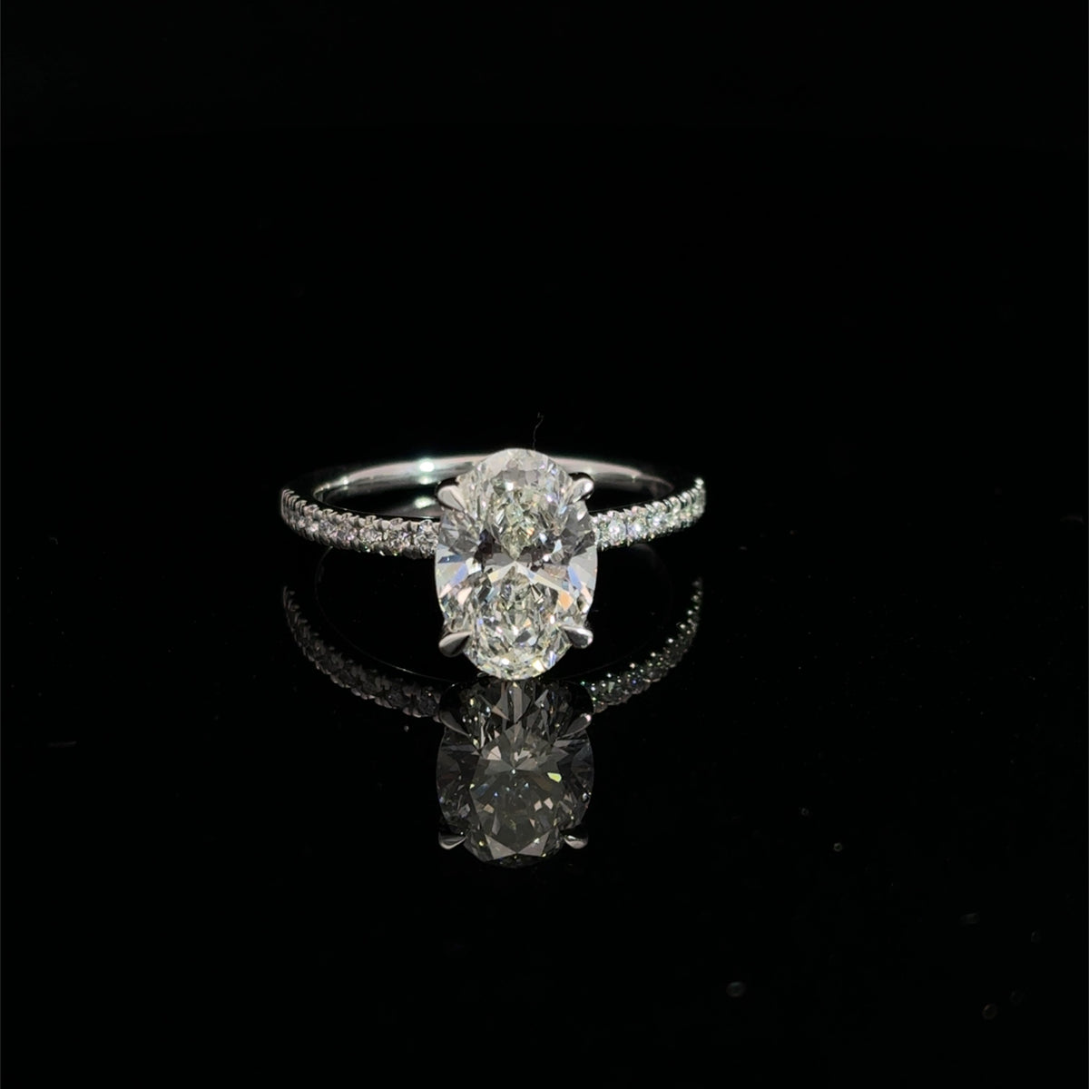 14K white gold engagement ring with a 2.00 carat oval lab grown diamond, 2.20 carats total