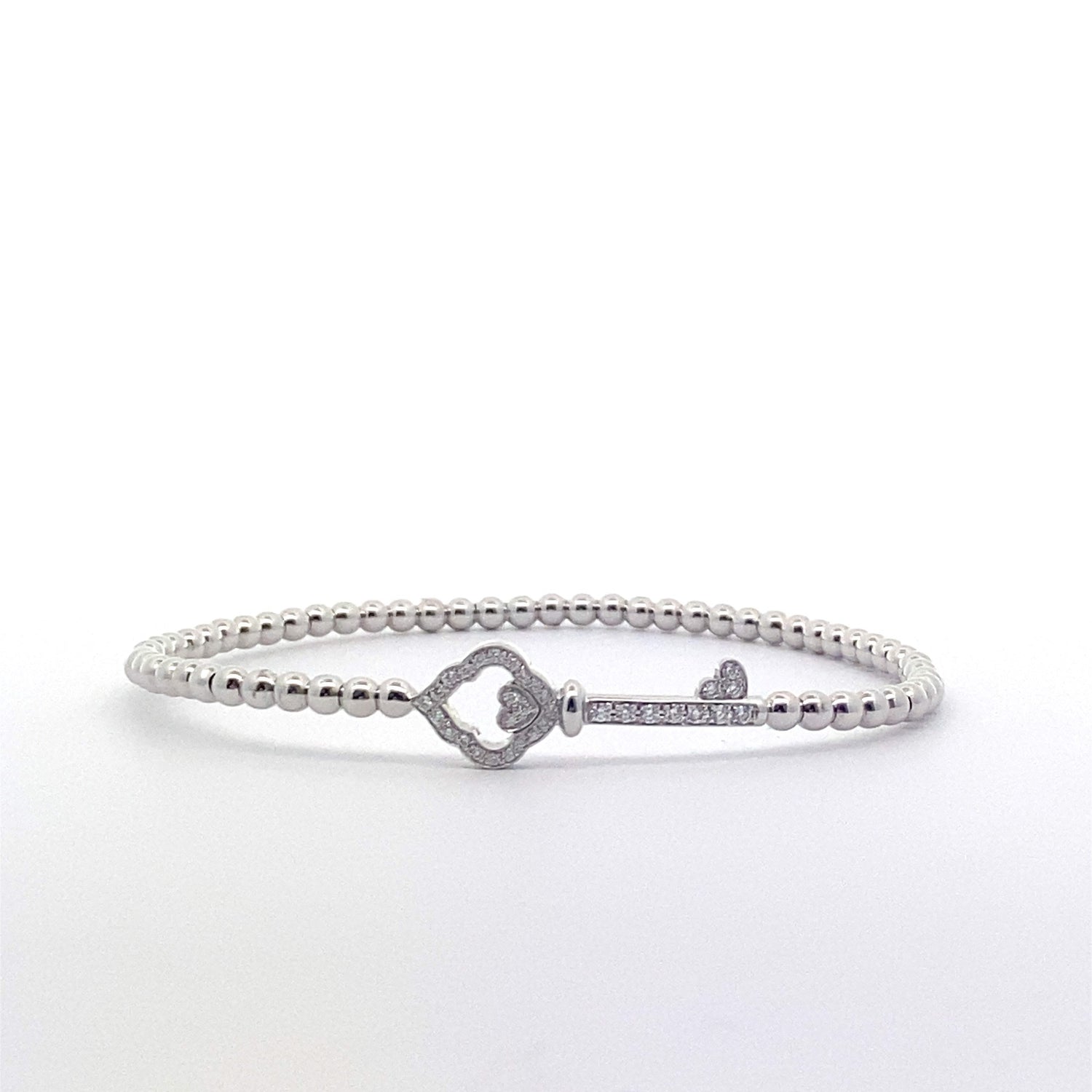 Pulsera elástica de oro blanco de 18 quilates con cuentas y candado con llave y diamantes