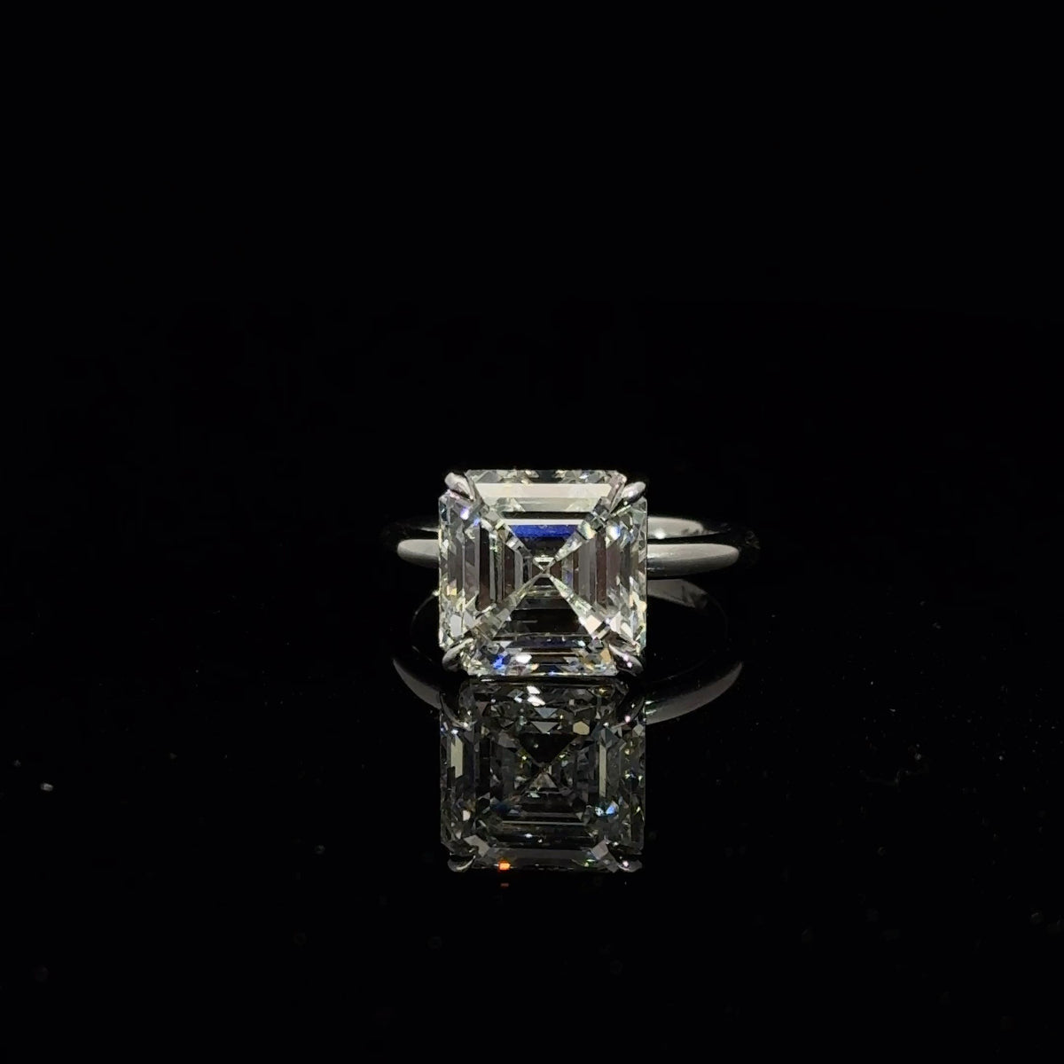 14K white gold engagement ring with a 7.06 carat asscher cut lab grown diamond