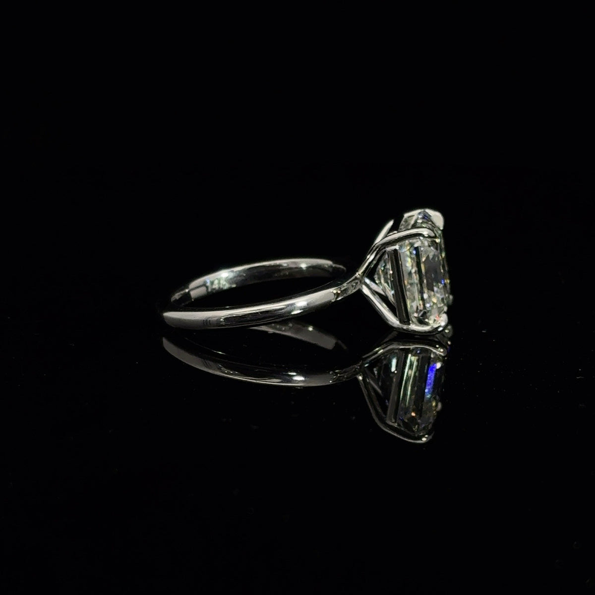 14K white gold engagement ring with a 7.06 carat asscher cut lab grown diamond