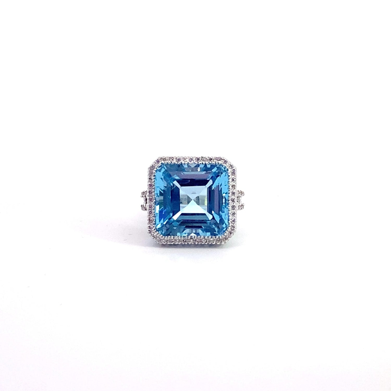 Anillo de oro blanco de 18 quilates con topacio azul y diamantes italianos de talla Asscher